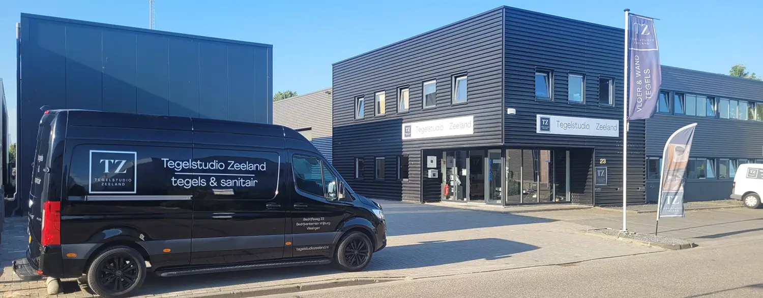 tegelstudio zeeland bedrijfsweg 23 vlissingen Foto van het pand van Tegelstudio Zeeland in Vlissingen (tegels en sanitair), met onze bezorgauto op de voorgrond